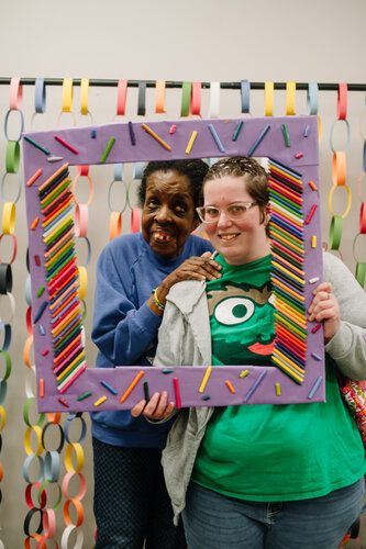 two women who have a frame